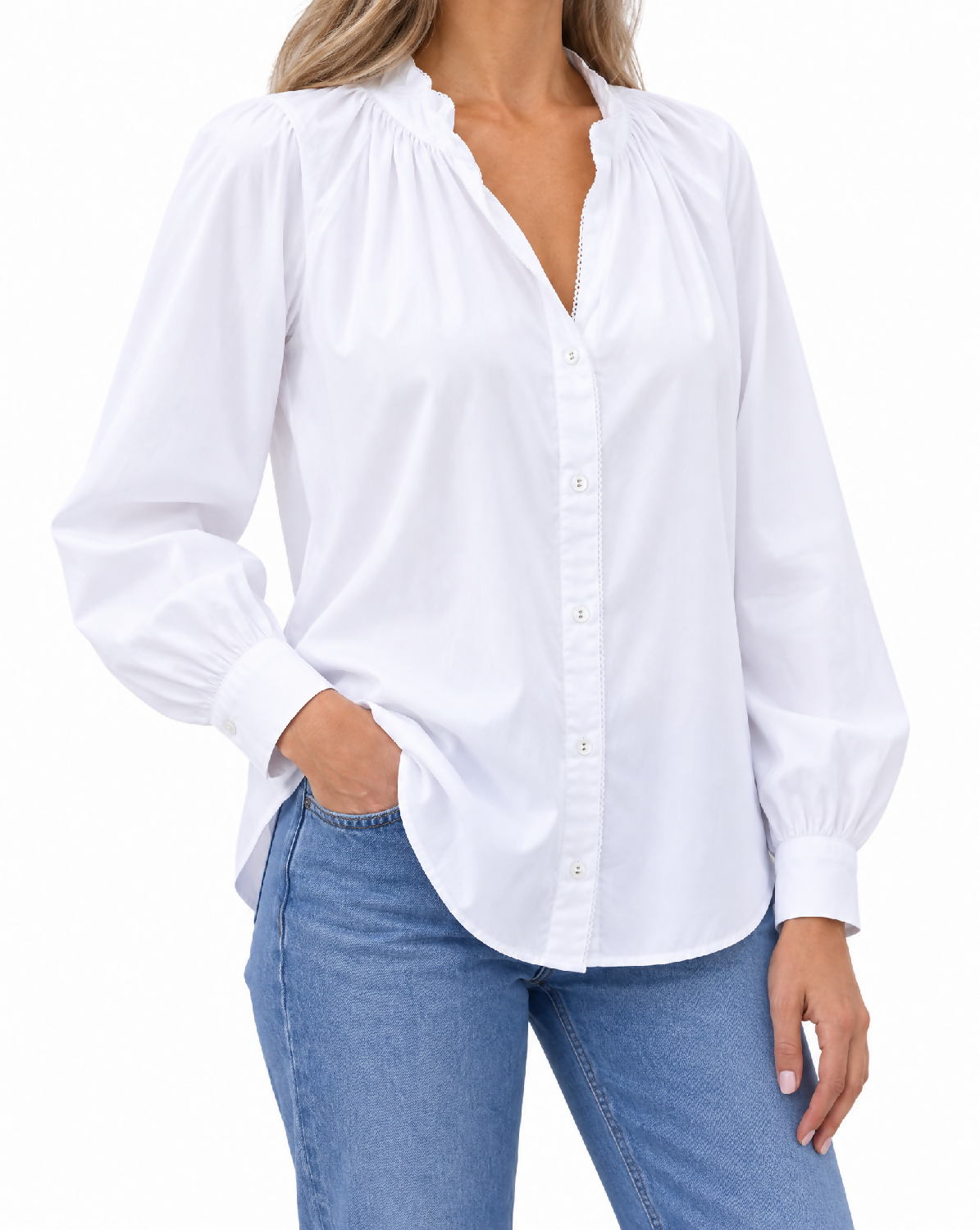 Generated with Kive.ai - Image 1_ Image 2_ and Image 3 define the exact white blouse identity and garment details_ including its gathered neckline_ open front_ button placket_ relaxed fit_ long sleeves_ and gathered butto
